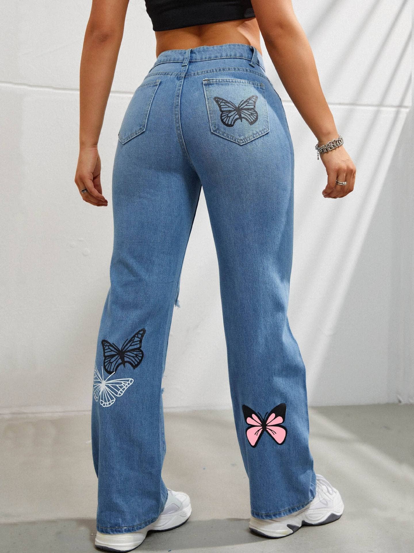 Tourtiwi - Women's butterfly print ripped high waist denim trousers: Blue / XL
